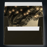 Vintage Rustic Carved Oak Tree Wedding Envelope<br><div class="desc">Design interior features a gorgeous oak tree over a vintage distressed background with string lights. Exterior is set to a dark deep brown shade to match the invitations set in colour code hex: #241F15 You can change the exterior to the colour of your choosing. NOTE: you will need to remove...</div>