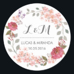 Vintage Rustic Floral Wreath Wedding Favour Sticke Classic Round Sticker<br><div class="desc">Vintage and rustic floral wreath wedding thank you sticker. Decorated with watercolor drawing of flowers, leaves and berries. Monogram sticker for wedding favour or wedding invitation envelope seals. Customise the wording for any special occasion. Spring wedding favour, bridal shower gift label, birthday party, engagement dinner, baby shower and much more....</div>