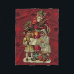 Vintage Santa Christmas Music Singing Fleece Blanket<br><div class="desc">Vintage Santa Claus Playing the Violin Santa Claus is having great fun in this reproduction of a vintage Christmas card. He's playing a violin as the two children in front of him are holding a candle, reading the sheet music, and singing along with a wonderful Christmas song. At their feet...</div>