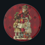 Vintage Santa Christmas Music Singing Magnet<br><div class="desc">Vintage Santa Claus Playing the Violin Santa Claus is having great fun in this reproduction of a vintage Christmas card. He's playing a violin as the two children in front of him are holding a candle, reading the sheet music, and singing along with a wonderful Christmas song. At their feet...</div>
