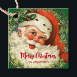 Vintage Santa Claus with Pine Wreath Favour Tags<br><div class="desc">Favour tags with a retro image featuring a smiling happy Santa Claus surrounded by a pine wreath with a sprig of holly in his cap.</div>