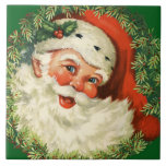 Vintage Santa Claus with Pine Wreath Tile<br><div class="desc">Ceramic tile with a retro image featuring a smiling happy Santa Claus surrounded by a pine wreath with a sprig of holly in his cap.</div>
