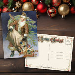 Vintage Santa with Presents Holiday Postcard<br><div class="desc">Gilt-edged old world Santa pouring toys from a large bag with a Christmas tree tied to his back.</div>