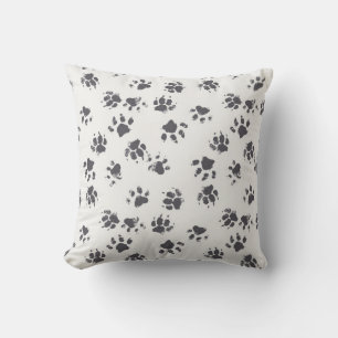 vintage seamless pattern with paw footprints of a cushion
