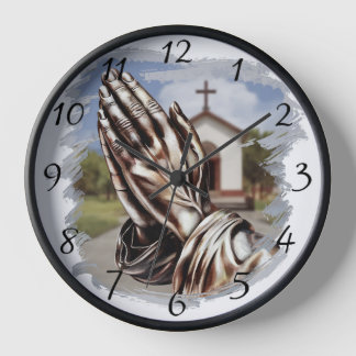 Vintage silver-looking Praying Hands with a Church Clock