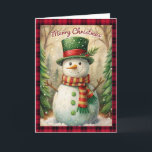 Vintage Snowman Merry Christmas Buffalo Plaid Holiday Card<br><div class="desc">Send warm holiday cheer with this charming snowman Christmas card. Featuring a cheerful snowman in a green top hat and red striped scarf, framed by a classic red and black buffalo plaid border, this card captures the cosy spirit of a winter wonderland. Perfect for anyone who loves rustic holiday designs,...</div>