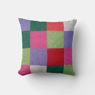 vintage style knitted patchwork squares colourful cushion