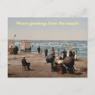Vintage sun bathing people on the beach postcard