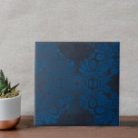 Vintage Symmetrical Dark Blue Floral Pattern Tile<br><div class="desc">This beautiful ceramic tile features a stunning blue floral pattern on a dark blue background. The symmetrical design consists of large flowers and leaves outlined in a lighter shade of blue, creating a striking contrast against the textured dark blue background. Whether employed as a standalone decorative piece or integrated into...</div>
