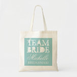 Vintage team bride wedding tote bags | Teal blue<br><div class="desc">Vintage team bride wedding tote bag with personalised name. Vintage chic style design. Customise for bridesmaids,  flower girls,  maid of honour,  mother of the bride,  guests etc. Elegant script text for name. Teal turquoise blue colour.</div>