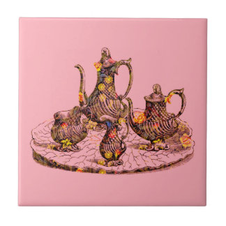 Vintage teapots on pink  decorative tile