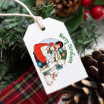 Vintage Teddy Bear Merry Christmas Gift Tags<br><div class="desc">Transport yourself to a bygone era with our Vintage Christmas Gift Tag, featuring a restored illustration from a 1915 postcard. This timeless illustration captures the essence of yesteryear, depicting a sweet girl in a festive red dress, cradling a precious baby doll, and accompanied by an adorable white teddy bear adorned...</div>