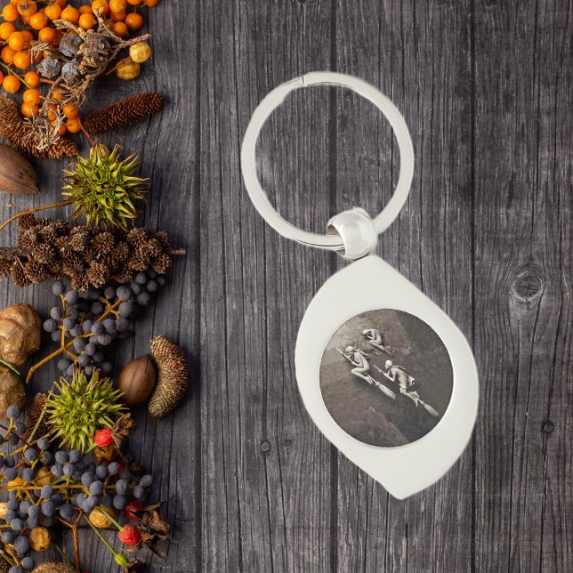 Vintage Three Halloween Witches Flying Brooms Key Ring (Three pretty white witches flying on brooms on shades of brown silver keychain.)