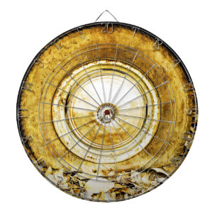 Vintage wheel on autumn leaves dartboard