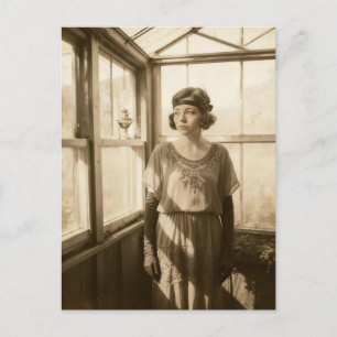 Vintage woman in a greenhouse sepia photo  postcard
