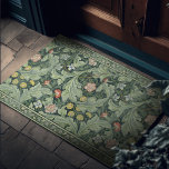 Vintage Woodland William Morris Green Floral Doormat<br><div class="desc">Introducing our exquisite doormat adorned with a floral pattern by the legendary William Morris. Recognised for his pivotal role in the Arts and Crafts Movement, Morris celebrated the beauty of nature and traditional craftsmanship, developing patterns that have achieved timeless appeal. His pattern, showcasing a harmonious blend of light green and...</div>
