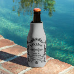 Vintage Year Aged to Perfection Custom Birth Year Bottle Cooler<br><div class="desc">Some things just get better with age, am I right? Show that special someone in your life how special they are to you, by celebrating with this "Aged to Perfection" vintage logo customised with their birth year! Change the birth year to personalise this item as a special birthday gift. A...</div>