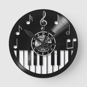 Vinyl record piano and music elements round clock