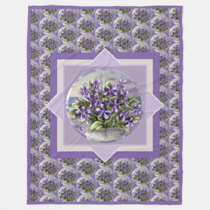 violets in a moon jar fleece blanket