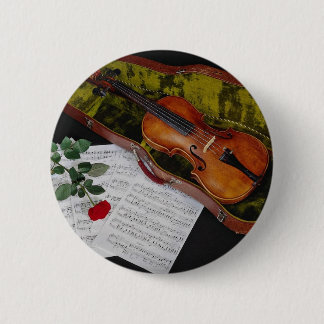 Violin and red rose on black background 6 cm round badge