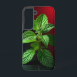 "Vivid Mint Plant Macro – Botanical Green on Black Samsung Galaxy Case<br><div class="desc">Bring a breath of freshness and nature’s elegance into your space with this vivid macro photograph of a mint plant. Captured in stunning detail, the crisp green leaves pop dramatically against a moody black background with a striking red gradient. Ideal for kitchen decor, herbal-themed gifts, botanical lovers, or anyone who...</div>