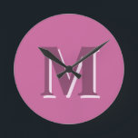 vivid solid pink monogram, round clock<br><div class="desc">vivid solid pink monogram,  Round Clock.
Hex colour code #CB649C</div>