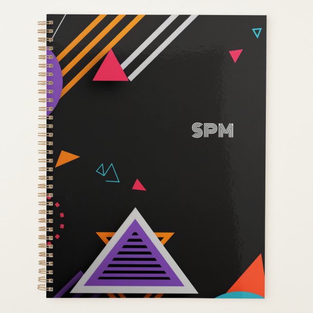 Vividly-coloured shapes on a dark background planner (Front)