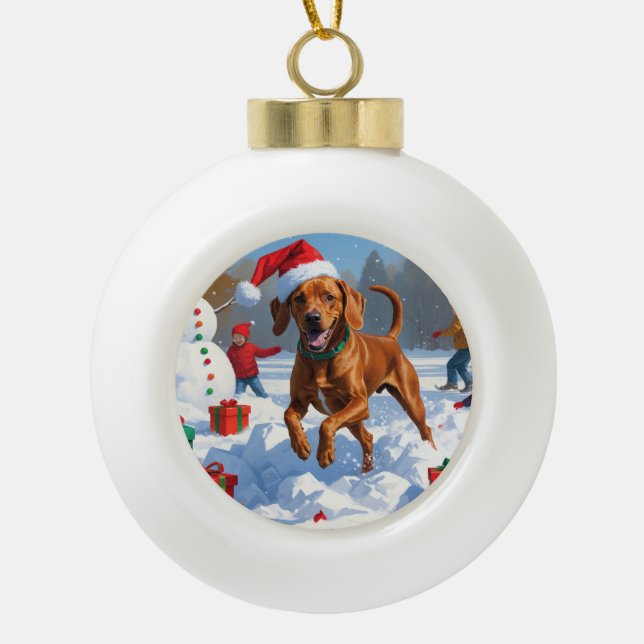 Vizsla Running in Snow with Christmas Hat Ceramic Ball Christmas Ornament (Front)