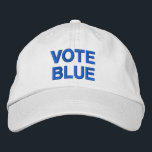 Vote Blue bold text political election Embroidered Hat<br><div class="desc">Spread the message to vote for liberal democrats in political elections with a "VOTE BLUE" baseball hat featuring bold blue text on a white background. You can choose other colours and styles of hats in the sidebar. To see the design Vote Blue on other items, click the "Rocklawn Arts" collection...</div>