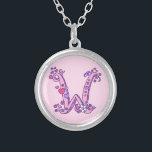 W monogram decorative letter necklace<br><div class="desc">Pretty hearts and flowers letter W monogram pendant. Whimsical letter drawing of the capital initial letter W ideal for gifting girls with a name that begins with W. Background colour can be changed if required,  currently light pink. © Original drawing and design by Sarah Trett www.sarahtrett.com for www.mylittleeden.com</div>
