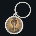 Wadjet – Ägyptische Schlangengöttin´7 Key Ring<br><div class="desc">Wadjet ist eine Kobra-Göttin aus der ägyptischen Mythologie und Schutzgöttin der Pharaonen sowie von Unterägypten. Sie steht für Schutz,  Macht und königliche Autorität.</div>