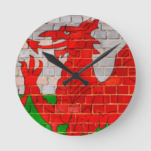 Wales flag on a brick wall round clock