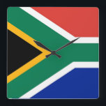 Wall Clock with Flag of South Africa<br><div class="desc">Keep time in sync with the spirit of South Africa using this remarkable wall clock featuring the country's flag! Celebrate the vibrant culture and rich heritage of South Africa with this eye-catching wall clock, adorned with the iconic colors and symbols of the South African flag: the horizontal bands of red,...</div>