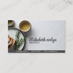 Warm Artisan Bread Display with Natural Accents Business Card