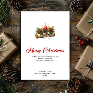 Warm Christmas candles on rustic log greeting Holiday Card