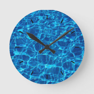 WATER.  CLEAR BLUE OCEAN WATER WATCH ROUND CLOCK