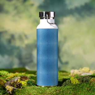 Water Droplets Against Blue Sky Bottle