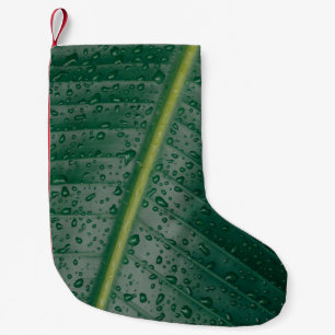 Water droplets on banana leaf small christmas stocking