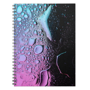 Water droplets on glass panel notebook