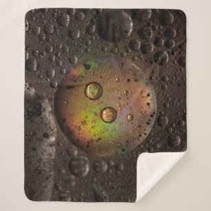 Water droplets on glass panel sherpa blanket