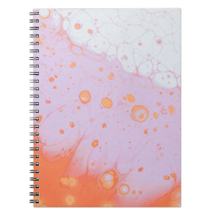 WATER DROPLETS ON RED SURFACE NOTEBOOK