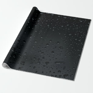 water drops on black window wrapping paper