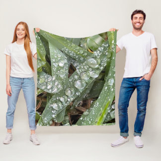 Water drops on grass fleece blanket