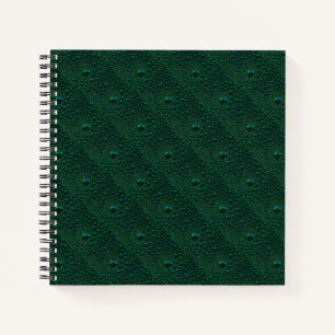 Water Drops on Green Metal Notebook