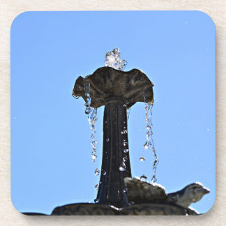 Water fountain up to the sky with water droplets coaster