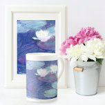 Water Lilies Blue Water Claude Monet Bone China Mug<br><div class="desc">A fine art Bone China Mug with the impressionist painting,  Water Lilies (1897) by Claude Monet (1840-1926). A French Impressionist painter. Inspired by his own garden in Giverny,  France. Lily pads with white flowers on brilliant blue water.</div>