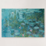Water Lilies (by Claude Monet, 1915) Jigsaw Puzzle<br><div class="desc">This design features a painting by French impressionist artist Claude Monet (1840–1926). It shows the an attractive arrangement of flowering water lilies on the pond at his home in Giverny, northern France. The lilies are painting in beautiful shades of turquoise and green. The original work was completed in 1915, and...</div>