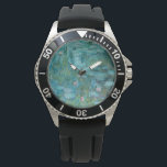 Water Lilies (by Claude Monet, 1915) Watch<br><div class="desc">This design features a painting by French impressionist artist Claude Monet (1840–1926). It shows the an attractive arrangement of flowering water lilies on the pond at his home in Giverny, northern France. The lilies are painting in beautiful shades of turquoise and green. The original work was completed in 1915, and...</div>