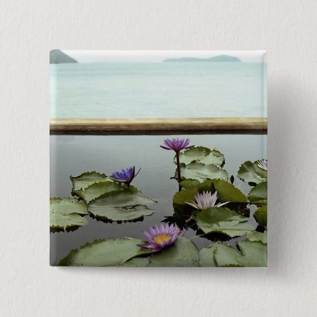 Water lilies in pond by ocean 15 cm square badge (Front)