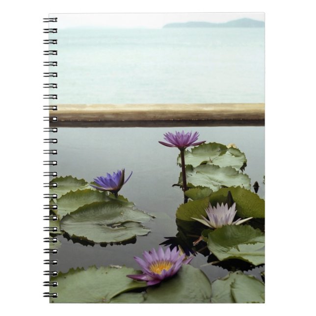 Water lilies in pond by ocean spiral notebook (Front)